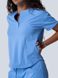 ALTA Kenzie Two-Pocket Scrub Top in Ceil Blue - neckline detail