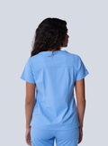 ALTA Taunya Two-Pocket Scrub Top in Ceil Blue - back view