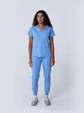 ALTA Taunya Two-Pocket Scrub Top in Ceil Blue - full front view