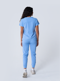 ALTA Taunya Two-Pocket Scrub Top in Ceil Blue - full back view