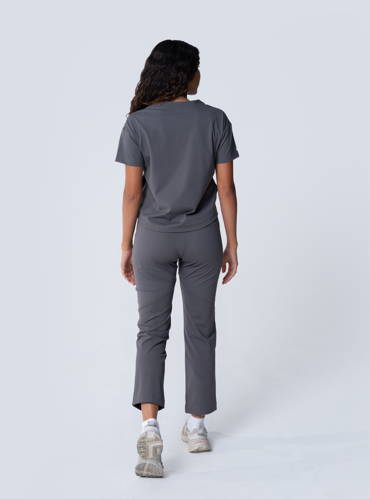 ALTA Kenzie Two-Pocket Scrub Top in Grey - full back view