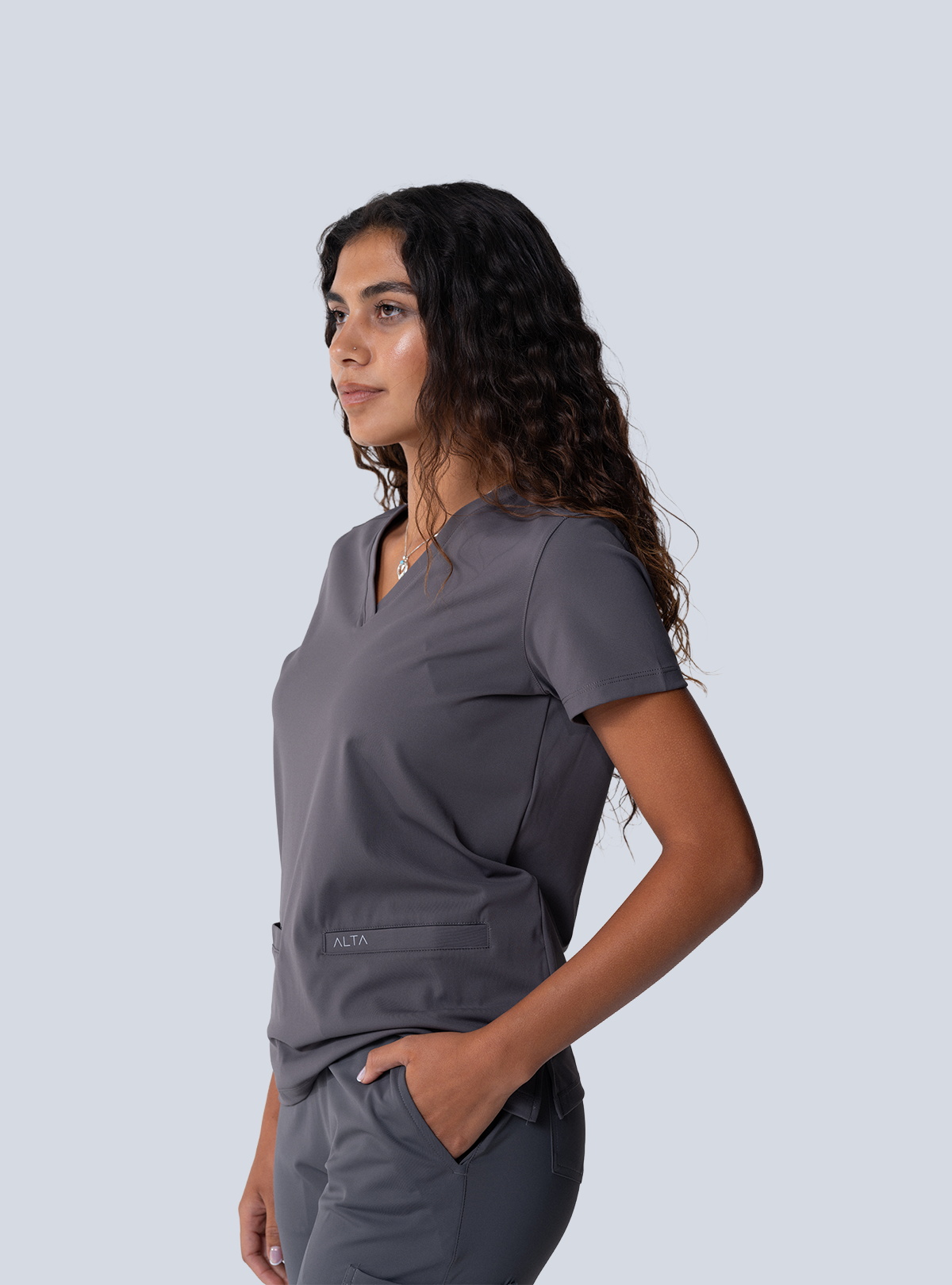 ALTA Taunya Two-Pocket Scrub Top in Grey - side view