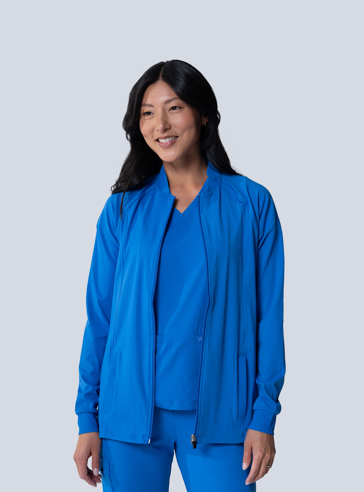 ALTA Kelly Performance Scrub Jacket in Royal Blue - side view
