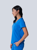 ALTA Rachel One-Pocket Scrub Top in Royal Blue - side view