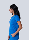 ALTA Taunya Two-Pocket Scrub Top in Royal Blue - side view